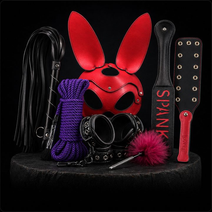 Bondage and fetish gear including a bunny mask, paddles, cuffs and rope